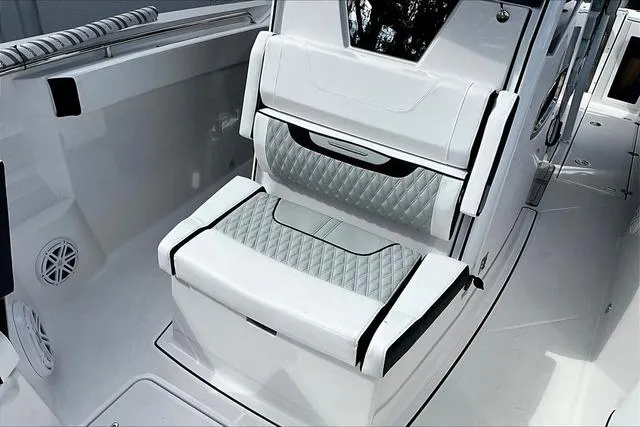 Slide: The Image of 2025 Blackfin 272CC boat interior with luxurious seating and modern design. - 17