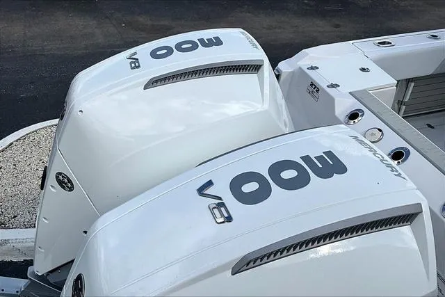 Slide: The Image of Twin Mercury 300 V8 engines on a 2025 Blackfin 272CC boat. - 23