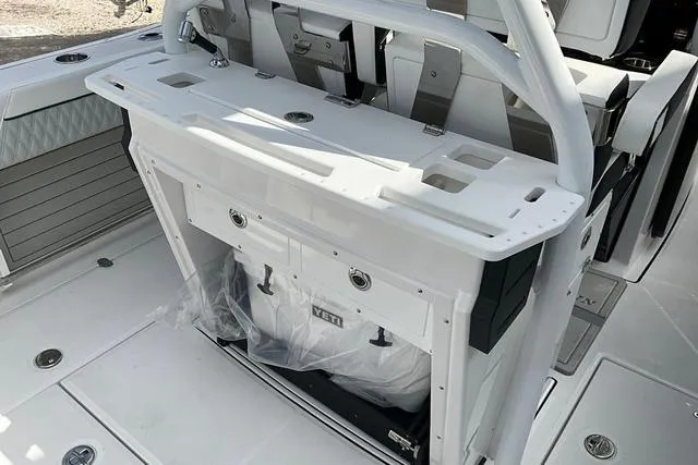 Slide: The Image of 2025 Blackfin 272CC boat interior with seating and storage area. - 30