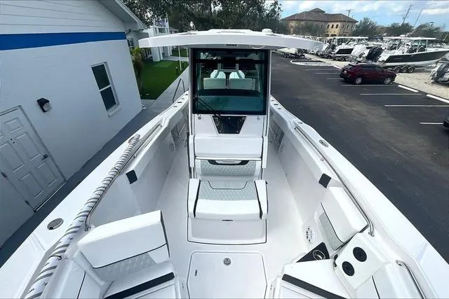 Slide: The Image of 2025 Blackfin 272CC boat interior, showcasing spacious seating and modern design. - 8