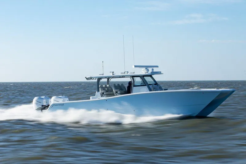 The Image of 2025 Freeman 43 boat cruising swiftly on open water. - 1