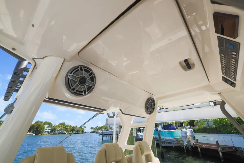 Slide: The Image of Interior view of 2021 Solace 345 boat with speakers and control panel. - 17
