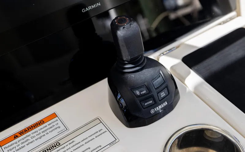 Slide: The Image of Yamaha joystick control on Solace 345 boat dashboard, 2021 model. - 37