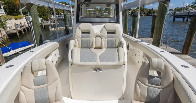 Slide: The Image of 2021 Solace 345 boat interior with luxurious seating and waterfront view. - 4