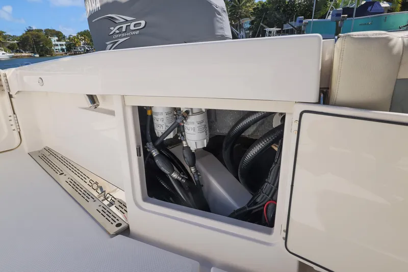 Slide: The Image of 2021 Solace 345 boat engine compartment with visible wiring and components. - 41