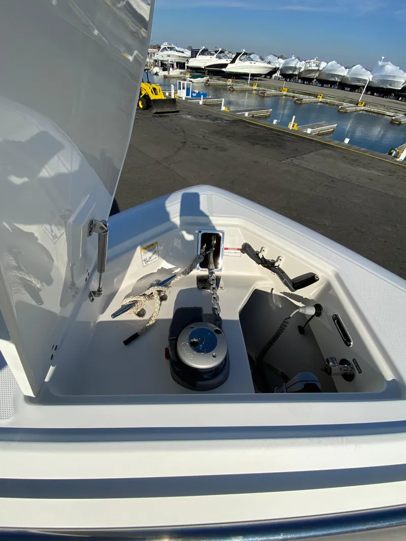 Slide: The Image of 2017 Boston Whaler 350 Outrage anchor compartment at marina. - 29