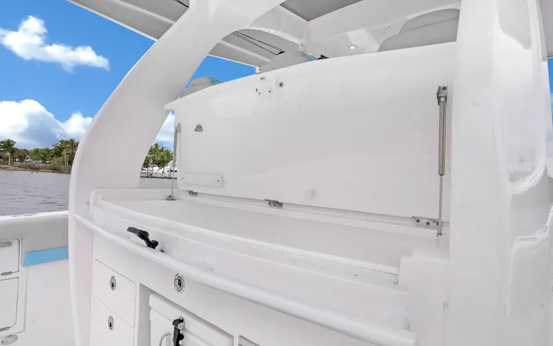 Slide: The Image of 2020 Intrepid 407 Panacea boat interior with sleek white cabinetry and storage. - 26