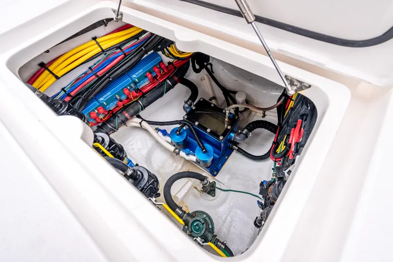 Slide: The Image of Engine compartment of 2020 Intrepid 407 Panacea, showcasing wiring and mechanical components. - 37