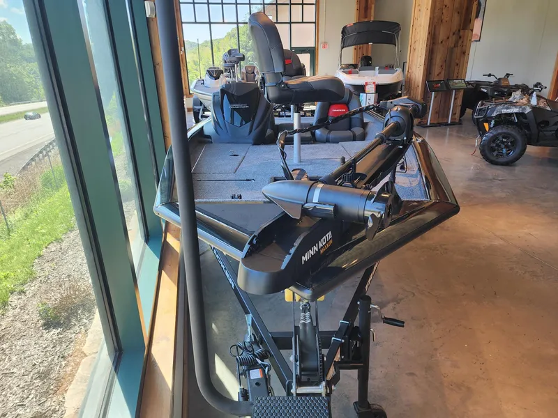 Slide: The Image of 2025 Tracker Pro Team 175 boat with Minn Kota trolling motor in showroom. - 3