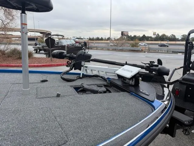 Slide: The Image of 2025 Nitro Z20 XL Pro boat with advanced Garmin trolling motor on a highway background. - 2