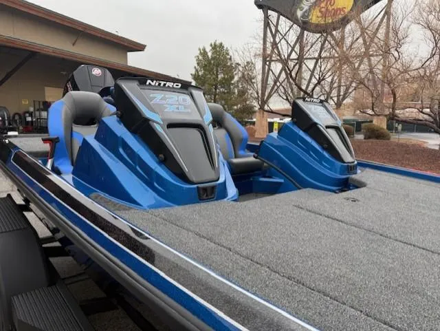 Slide: The Image of 2025 Nitro Z20 XL Pro boat with sleek blue design and advanced seating. - 3