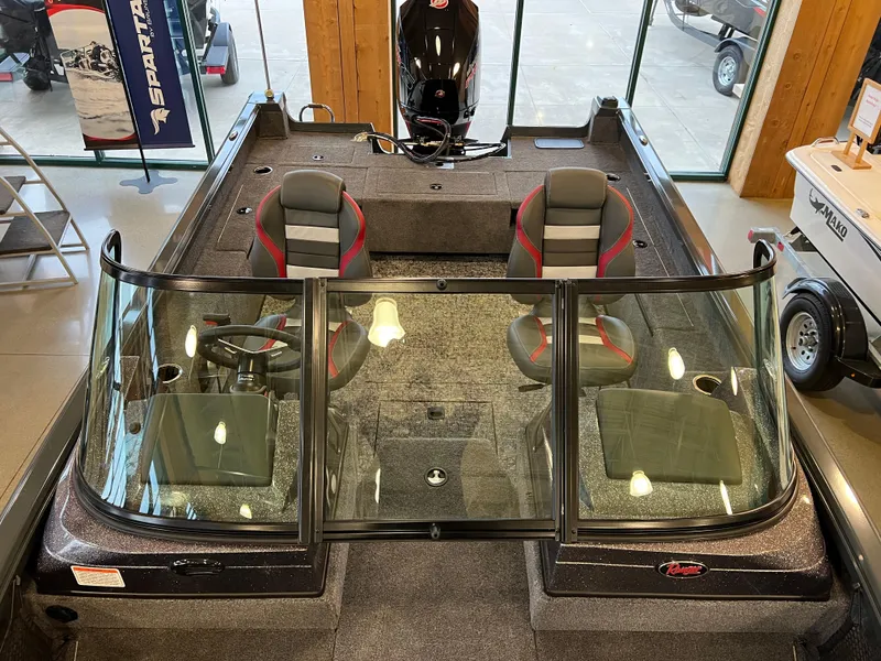 Slide: The Image of 2025 Ranger VS1882SC Reata boat interior with dual seats and windshield in showroom. - 6