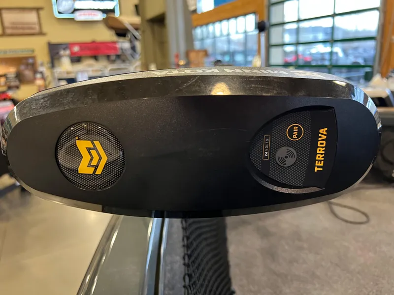 Slide: The Image of 2025 Ranger VS1882SC Reata boat with Terrova trolling motor, indoor showroom display. - 9