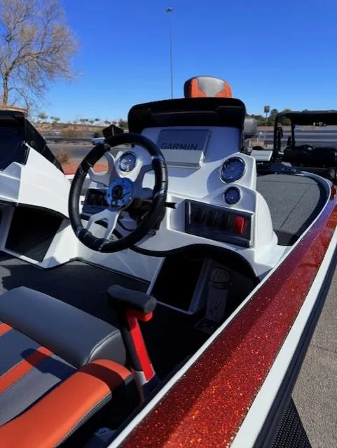 Slide: The Image of 2025 Nitro Z18 Pro boat interior with Garmin dashboard and steering wheel. - 10