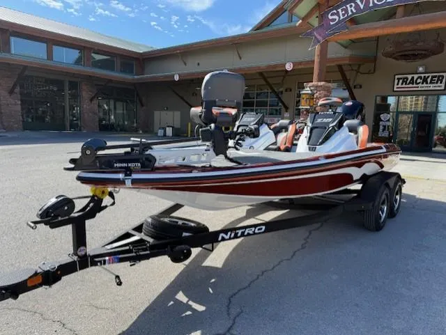 Slide: The Image of 2025 Nitro Z18 Pro boat on trailer outside a service center. - 3