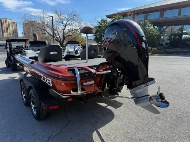 Slide: The Image of 2025 Nitro Z18 Pro boat with powerful outboard motor, parked outdoors. - 4