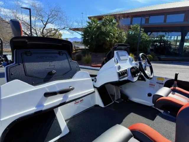 Slide: The Image of 2025 Nitro Z18 Pro boat interior with steering wheel and seating. - 6