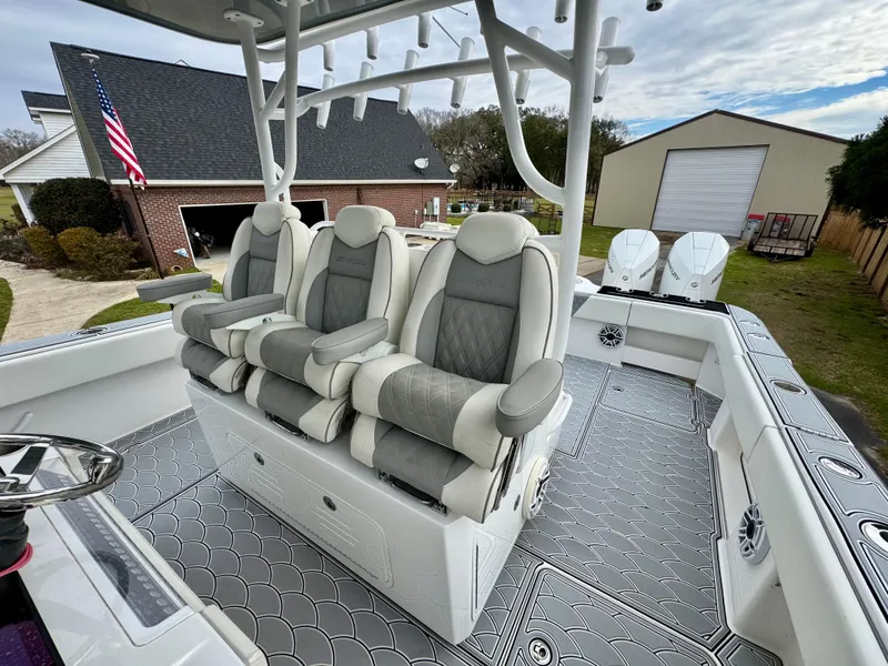 Slide: The Image of 2022 Invincible 35 Catamaran interior with luxurious seating and modern design. - 12