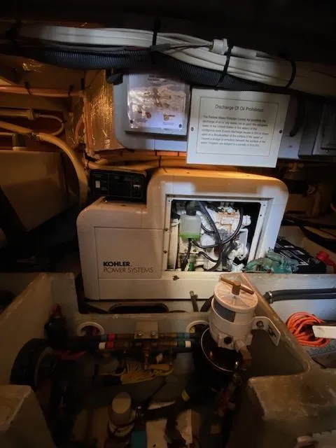 Slide: The Image of Engine room of 2004 Silverton 39 Motor Yacht with Kohler power system. - 13