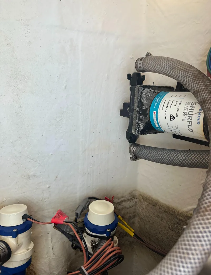Slide: The Image of Boat plumbing system with Shurflo pump in a 2020 Pathfinder 2500 Hybrid. - 16