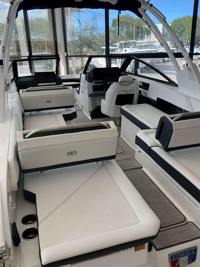 Slide: The Image of 2025 Cobalt R6 boat interior with luxurious seating and modern design. - 4