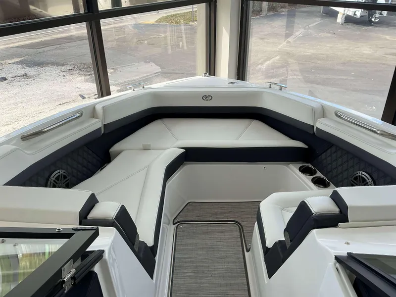 Slide: The Image of 2025 Cobalt R6 boat interior with luxurious seating and modern design. - 7