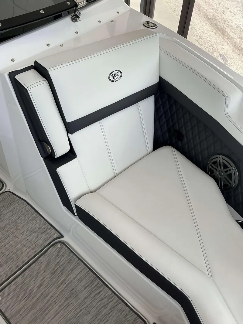 Slide: The Image of Luxurious white seating in 2025 Cobalt R6 boat interior. - 8