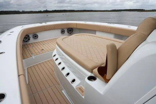 Slide: The Image of Luxurious 2026 Freeman 38 boat interior with beige seating and wood flooring. - 4