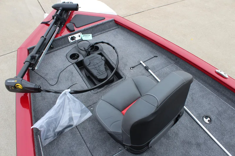 Slide: The Image of 2025 Tracker PT 175 TXW boat interior with seat and fishing equipment. - 11