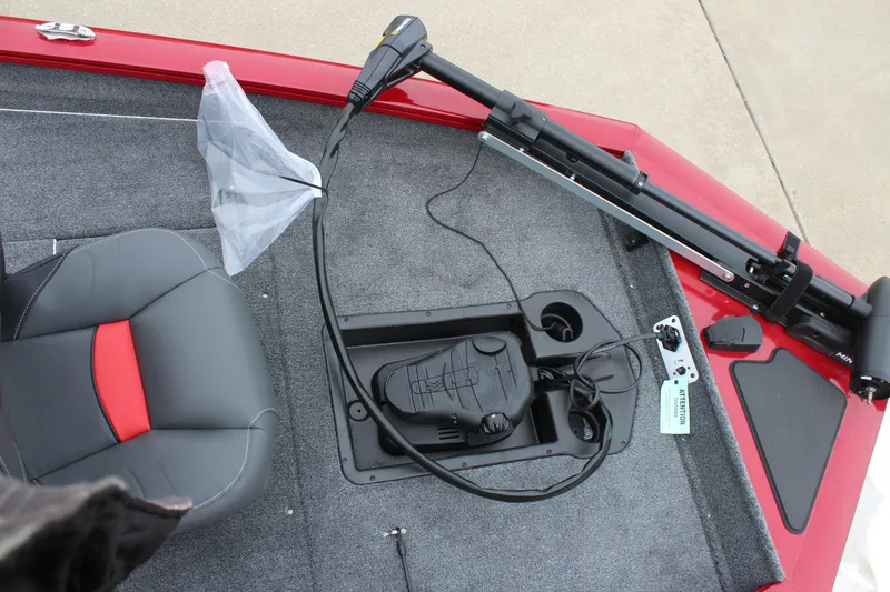 Slide: The Image of 2025 Tracker PT 175 TXW boat interior with seat and trolling motor. - 12