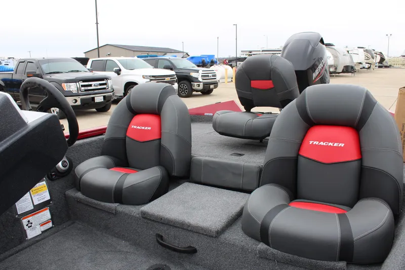 Slide: The Image of 2025 Tracker PT 175 TXW boat interior with gray and red seating. - 7