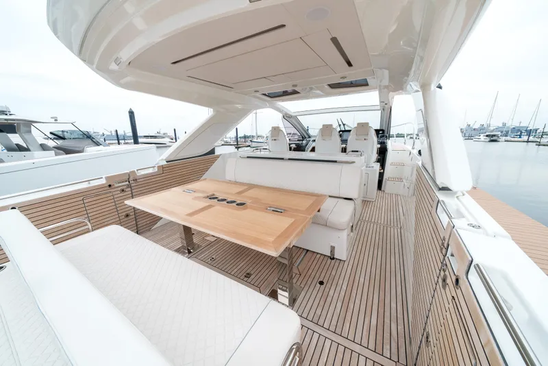 Slide: The Image of 2024 Jeanneau DB/43 OB luxury yacht with spacious deck and elegant seating area. - 29