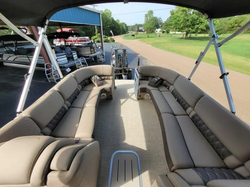 Slide: The Image of 2024 Bennington 25 RSB pontoon boat interior with luxurious seating and spacious layout. - 13