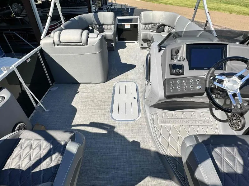 Slide: The Image of 2024 Bennington 23RSB boat interior with Yamaha VF250XB, featuring luxurious seating and modern dashboard. - 4