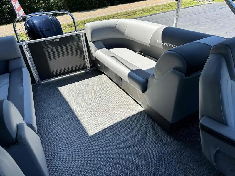 Slide: The Image of 2024 Bennington 23RSB boat interior with gray seating and Yamaha VF250XB engine. - 7
