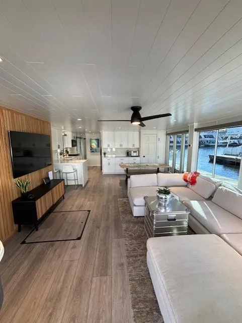 Slide: The Image of Modern interior of 1999 Horizon Stoke Houseboat with spacious living area and waterfront views. - 0