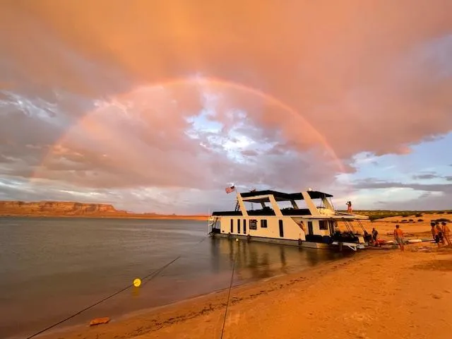 Slide: The Image of Houseboat on a lake under a vibrant rainbow at sunset, 1999 Horizon Stoke House. - 1