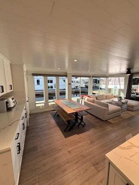 Slide: The Image of Spacious 1999 Horizon Stoke House interior with modern kitchen and cozy living area. - 16