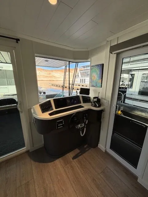 Slide: The Image of 1999 Horizon Stoke House interior with modern control panel and scenic window view. - 18