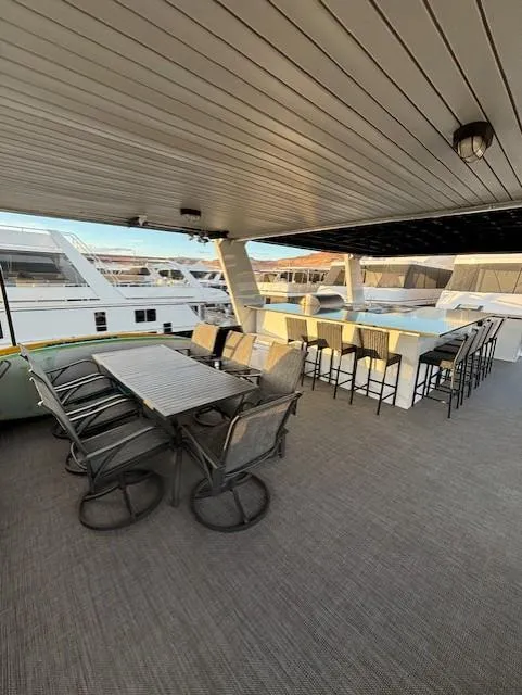 Slide: The Image of Spacious deck of 1999 Horizon Stoke House with seating and bar area. - 37