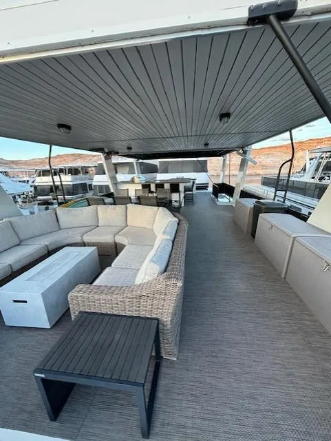 Slide: The Image of Spacious deck of 1999 Horizon Stoke House with modern seating and scenic views. - 38