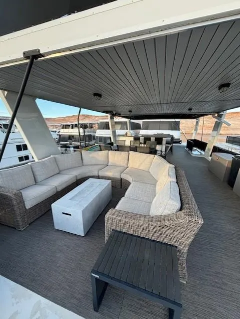 Slide: The Image of Spacious deck of 1999 Horizon Stoke House with modern seating and scenic views. - 41