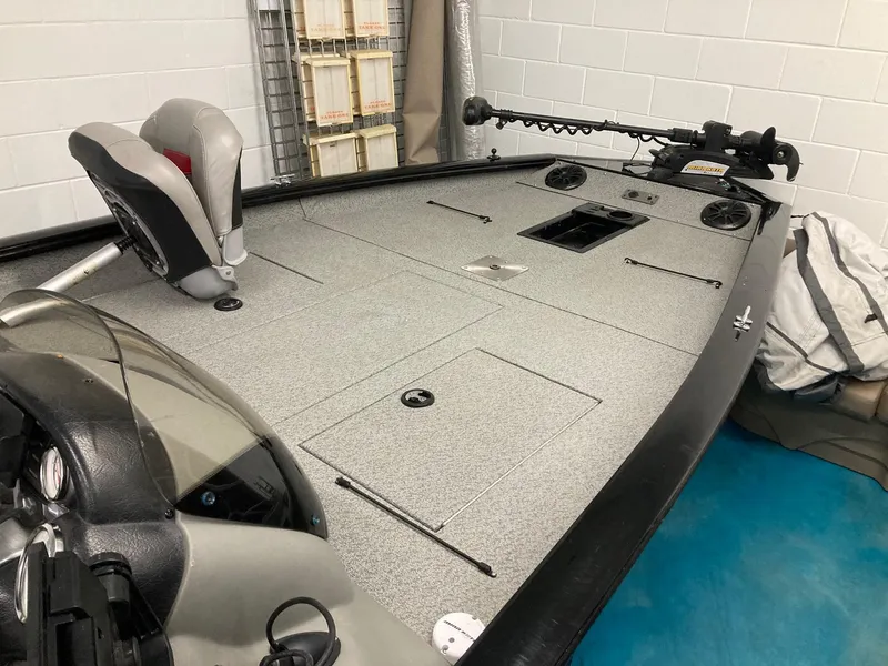 Slide: The Image of 2017 Bass Tracker PRO TEAM 190 TX boat interior with fishing deck and seating. - 6