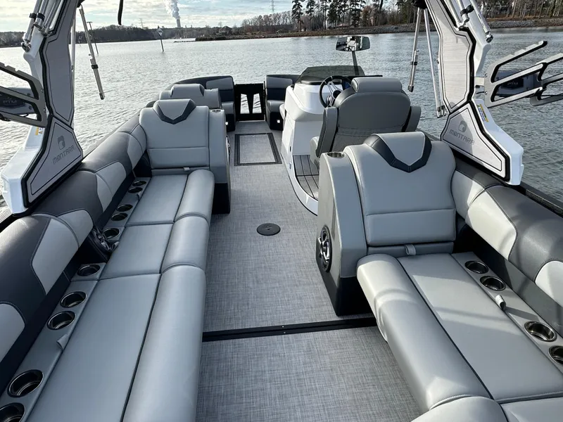 Slide: The Image of 2025 Montara Surf Boss 2.0 25 boat interior with luxurious seating and modern design. - 17