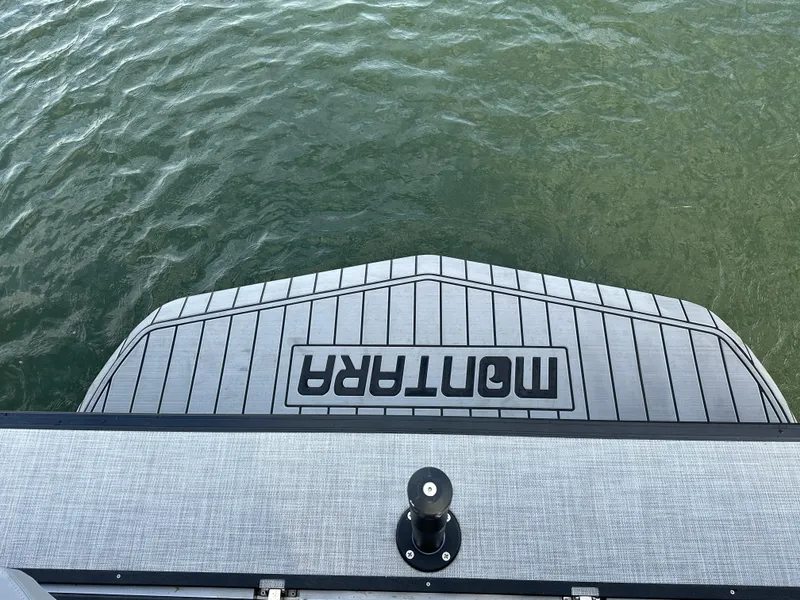 Slide: The Image of 2025 Montara Surf Boss 2.0 25 boat platform on water. - 18