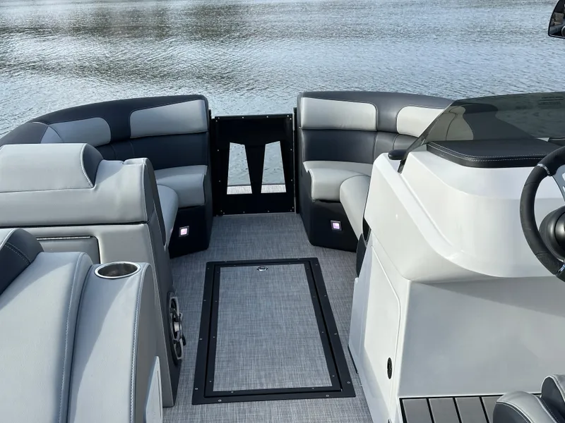 Slide: The Image of 2025 Montara Surf Boss 2.0 25 boat interior with sleek seating and modern design. - 27