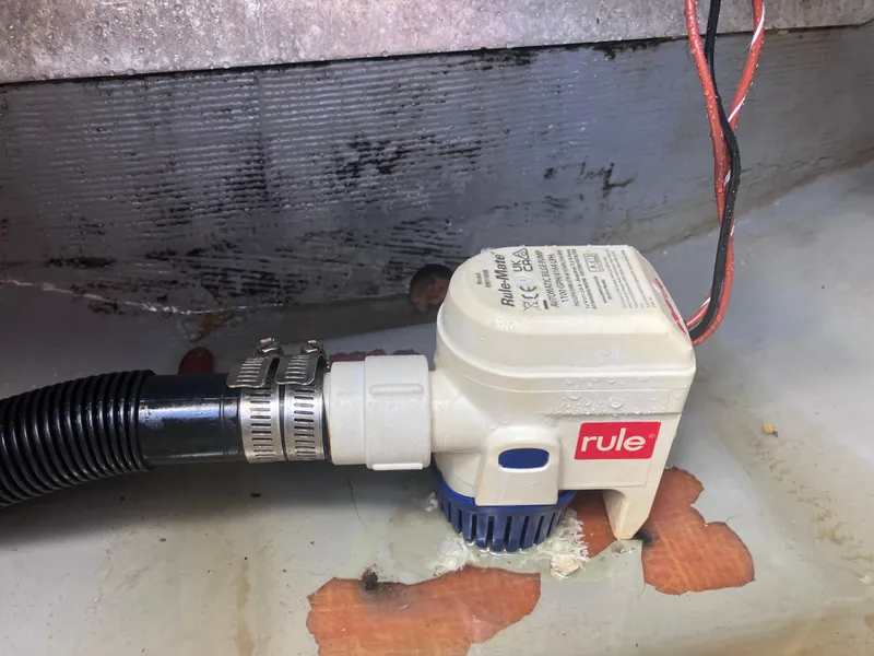 Slide: The Image of Bilge pump in 1998 Pro-Line 241 Walkaround boat, featuring Rule brand components. - 48