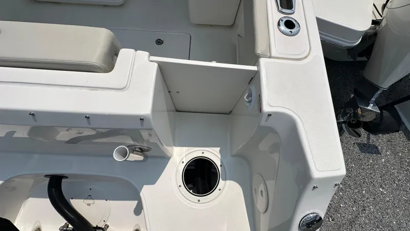 Slide: The Image of 2025 Boston Whaler 240 Vantage boat interior, featuring seating and storage compartments. - 4