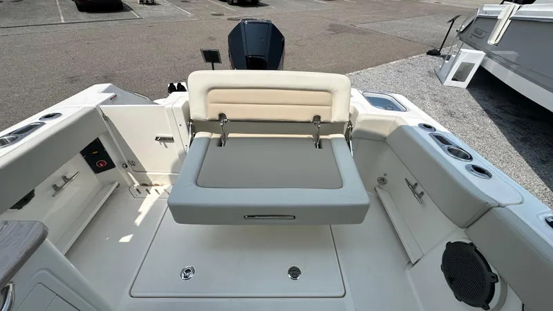 Slide: The Image of 2025 Boston Whaler 240 Vantage boat interior with seating and storage features. - 8