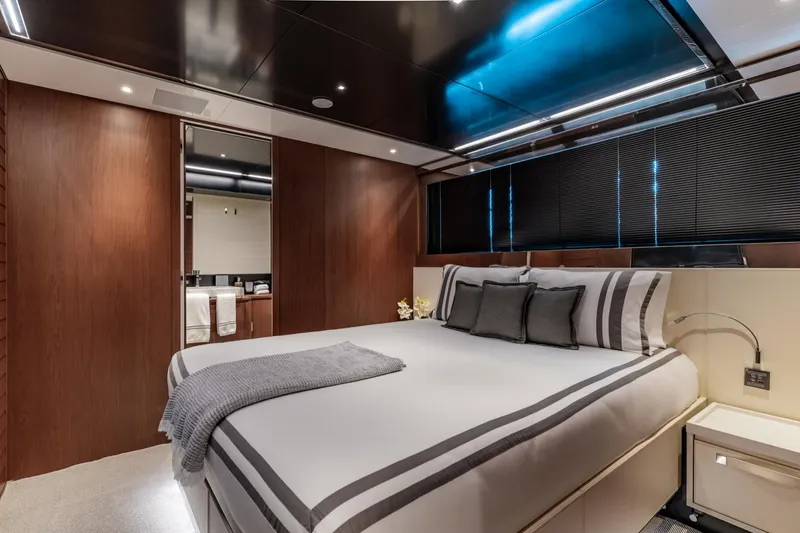 Slide: The Image of Luxurious bedroom interior of 2019 Riva ARGO yacht with modern design and elegant furnishings. - 14
